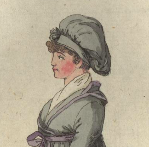 woman in a gray tam o-shanter cap