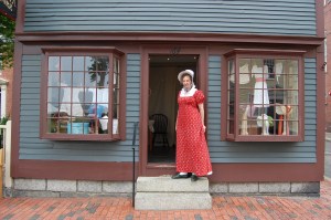 One of the Milliners Stands in the Doorway
